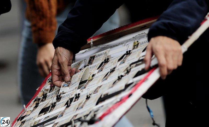 Loteros reportan aumento en ventas del número 29 en la lotería navideña debido a la dana.